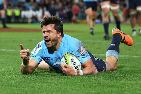 Try time: Waratahs veteran Adam Ashley-Cooper celebrates scoring a try during the win over the Crusaders.