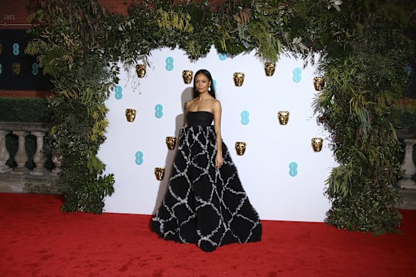Actress Thandie Newton poses for photographers upon arrival at the BAFTA awards in London.