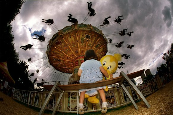 Sophie Wong watches the ride on the last day of Moomba, 1999.