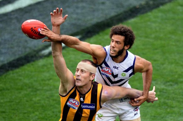 Hawthorn's David Hale in a ruck contest against Zac Clarke.