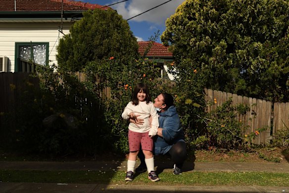 Maria Moschetti embraces her daughter Lily, in the front yard of their home in Fairfield. “There’s been a few really hard moments,” she said. “If it wasn’t for some of the help available in the area I don’t know how we would have made it through - services, some of the people, the special education unit at Lily’s school. There is a kebab shop near the train station that gives leftovers to the homeless. The mayor has been amazing – he posts on Facebook every day, keeps us informed.”