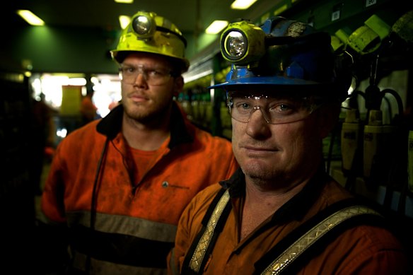 Springvale mine workers from left, Adam Powell and Darrin Francis, in the lamp room at the completion of their shift.
