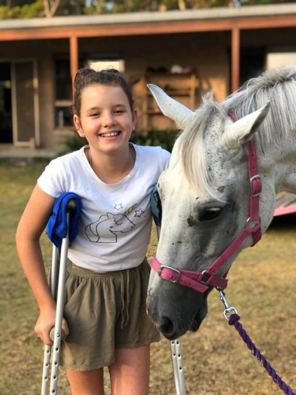 Amali Trama, 11, had a damaged ankle and scratches and bruises but was more than happy to see her horse again.