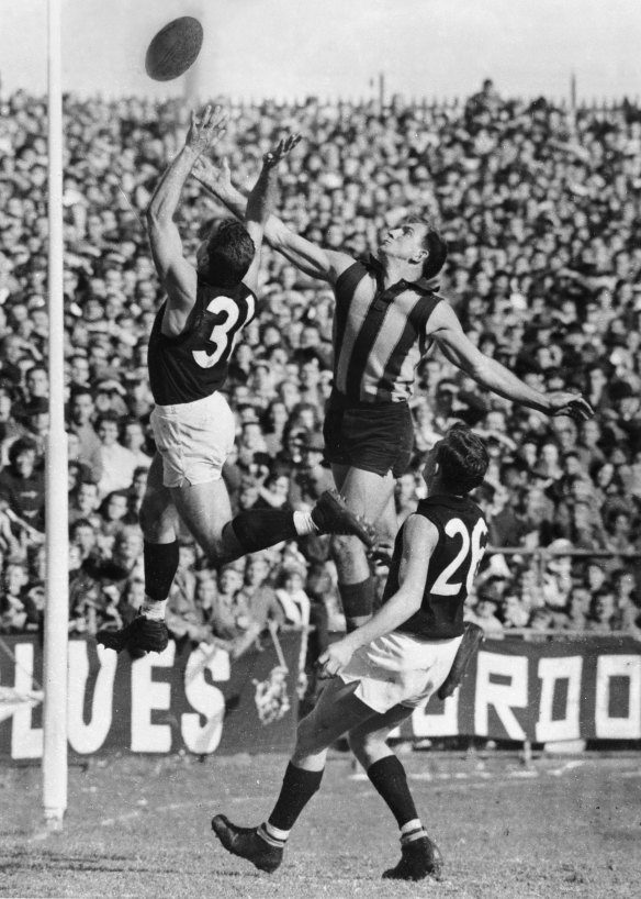 Barassi flies high to stop a goal in 1965.