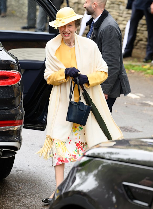 Princess Anne paired her vintage headwear with an apricot-coloured jacket and floral skirt. 