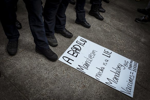 Police clash with protesters at the Shrine.