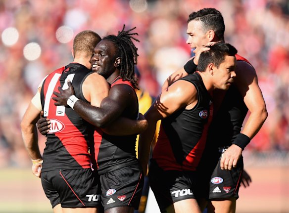 It was a long road but McDonald-Tipungwuti, seen here celebrating with Bombers teammates, has made it to the big league.