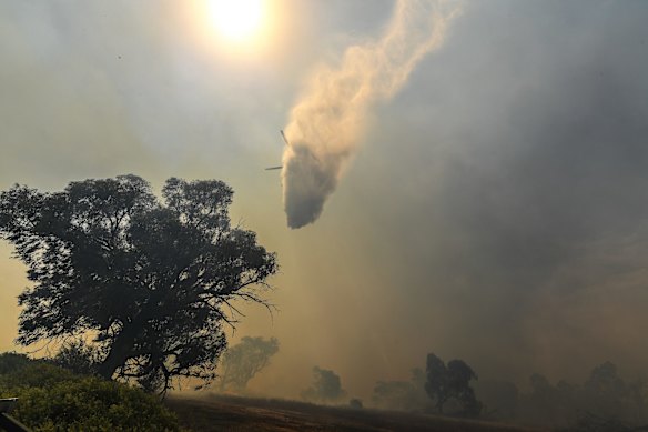 Water is dropped on the fire.