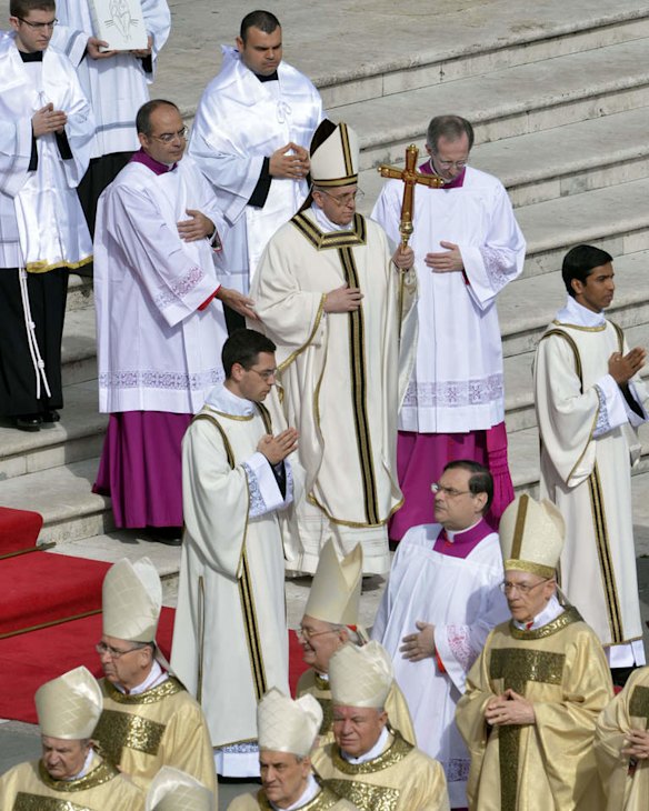 Pope Francis arrives for his grandiose inauguration mass in St Peter's Square.