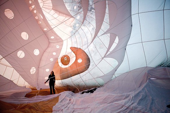 Artist Patricia Piccinini  with the balloon.