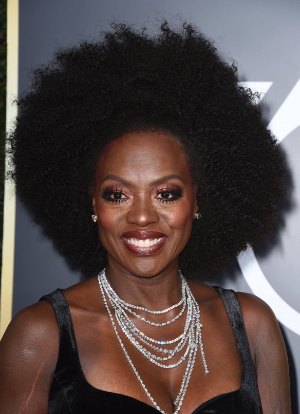 Viola Davis wore her natural hair to the Golden Globes, making more than just a fashion statement.