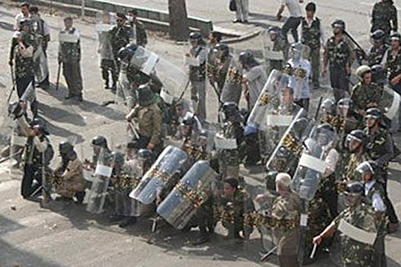 Iranian security personnel form up on a street in Tehran in this undated photo uploaded onto Twitter June 21, 2009.  Iranian opposition leader Mirhossein Mousavi urged his supporters on Sunday to continue their protests over a disputed presidential election, in a direct challenge to the leadership of the Islamic Republic.