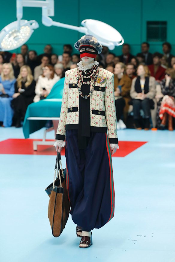 A model wears a creation as part of the Gucci women's Fall/Winter 2018-2019 collection.
