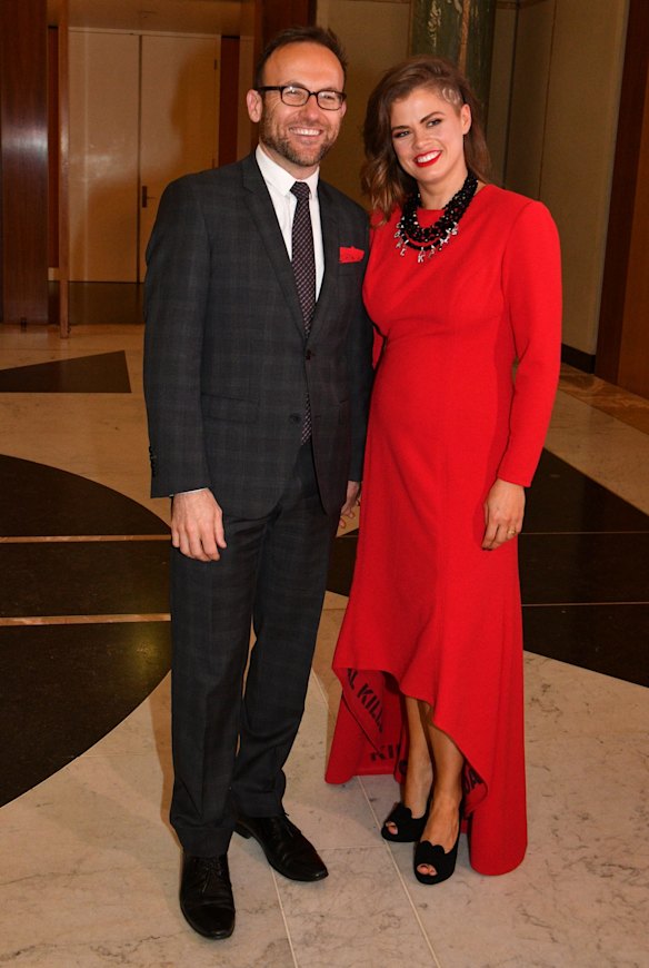 Greens Member for Melbourne Adam Bandt and wife Claudia Perkins arrive for the annual Mid Winter Ball at Parliament House in Canberra, Wednesday, September 12, 2018.