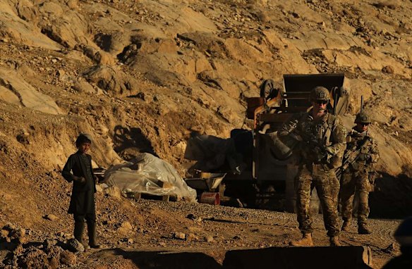 Australian soldiers searching for IED's near the Puza Bridge after an insurgent was arrested the night before with explosive matieral at this location. Dai Roshan Area in Uruzgan Province, Afghanistan.