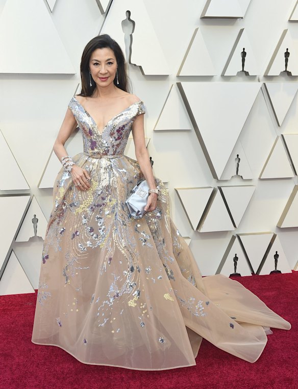 Michelle Yeoh arrives at the Oscars at the Dolby Theatre in Los Angeles wearing Ellie Saab.