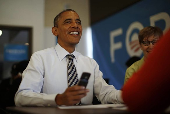 President Barack Obama makes calls to campaign volunteers from a field office in Chicago on Election Day 2012