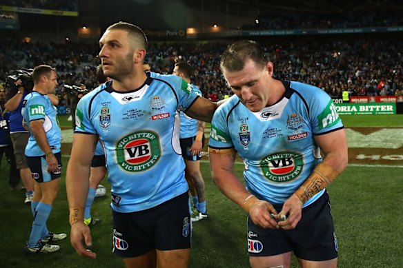 Robbie Farah of the Blues congratulates Paul Gallen of the Blues after game three.