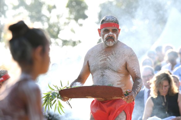 Koomurri dancers perform a smoking ceremony during the Australia Day Wugulora Morning Ceremony.