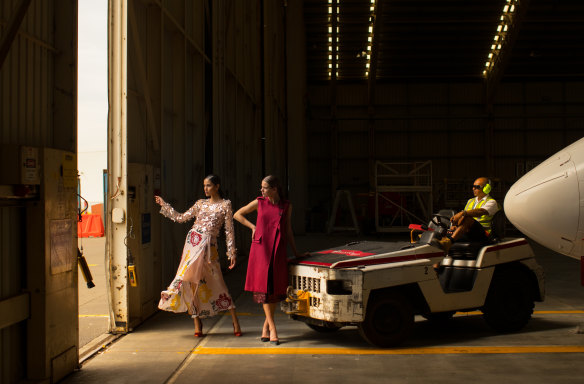 Models in Ginger and Smart pictured in the Virgin Australia hangar at Melbourne Airport. The fashion label will star in Australia's first runway in the sky on Tuesday.