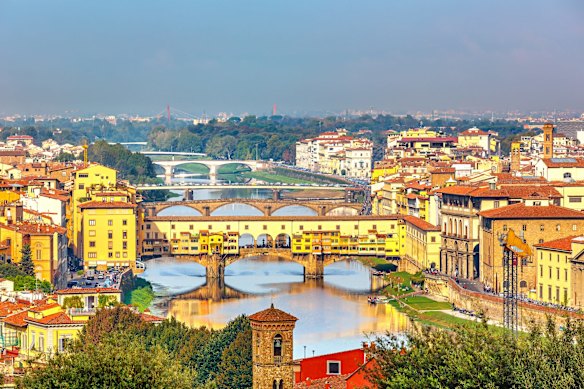 Ponte Vecchio, Florence, Italy: The medieval Italians clearly thought that sparing all that space purely to cross a river was wasteful, so built on the bridge as if it was a normal street.