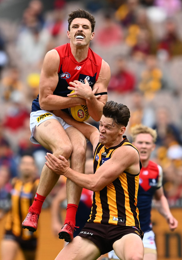 Jake Lever pulls in a mark for Melbourne.