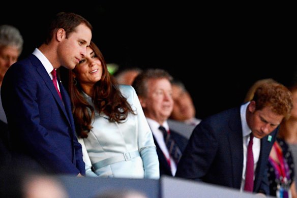 Prince William, Catherine, Duchess of Cambridge and Prince Harry at the opening ceremony.  Photo by Getty Images
