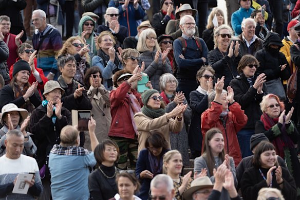 People gather on the steps of the Opera House for the memorial service of former Prime Minister Bob Hawke.