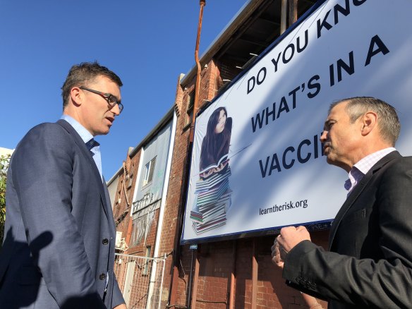 Perth MP John Carey and Health Minister Roger Cook are looking for ways to have any anti-vax billboard pulled down.