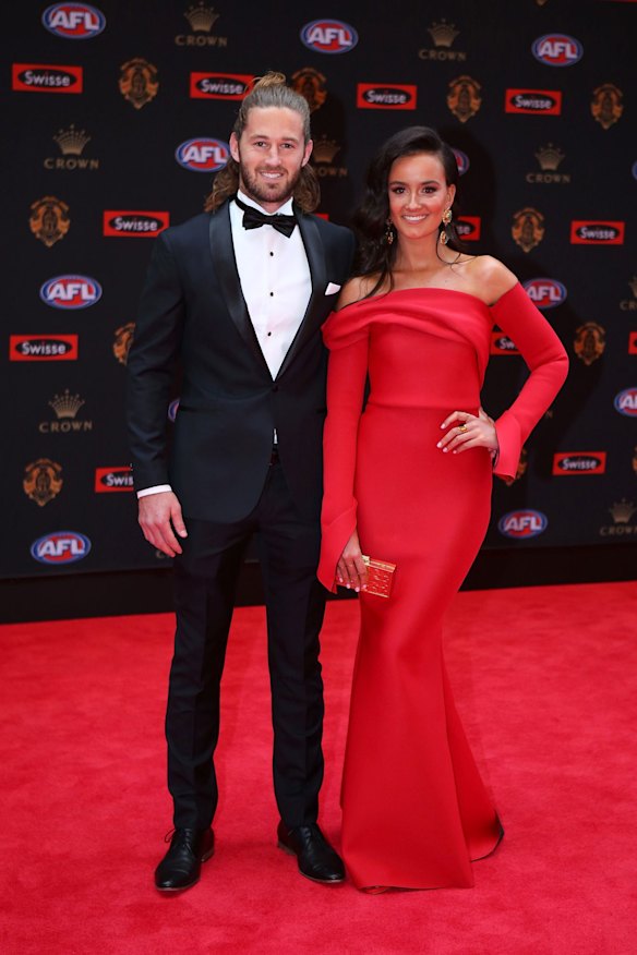 Callan Ward of GWS and Ruby Keddie pose on the red carpet ahead of the 2016 AFL Brownlow Medal count at Crown Palladium on September 26, 2016 in Melbourne, Australia.