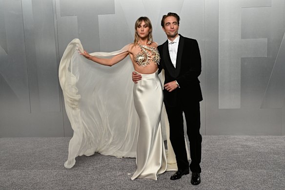 Suki Waterhouse and Robert Pattinson arrive at the Vanity Fair Oscar Party.