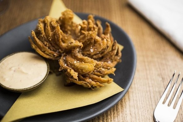 Share a blooming onion at Bar Brose.