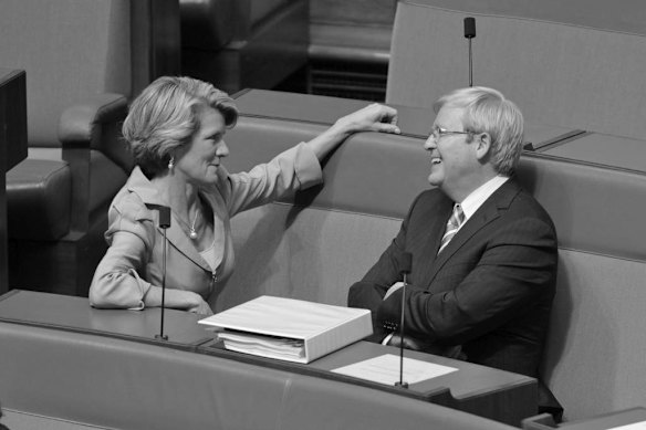 Backbencher Kevin Rudd talks with Deputy Opposition Leader Julie Bishop during a suspension of standing orders motion during question time at Parliament House Canberra on Wednesday 29 February 2012.