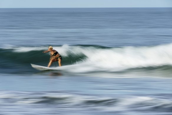Surfer Anat Lelior, of Israel, rides a wave during a practice session at Tsurigasaki beach at the Tokyo 2020 Olympics in Ichinomiya, Japan.
