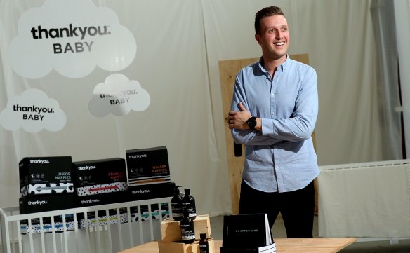 Daniel Flynn, co-founder and managing director of Thankyou, with the social enterprise's latest products: nappies.