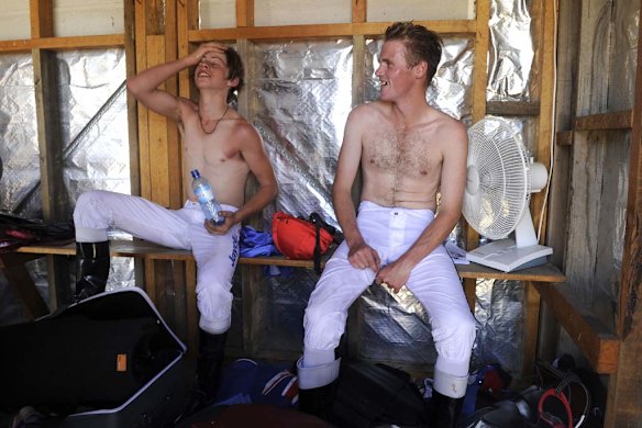 Canni Creek Picnic races at Buchan racecourse. Jockeys John Fitzgerald and Kane Harris trying to stay cool between races.