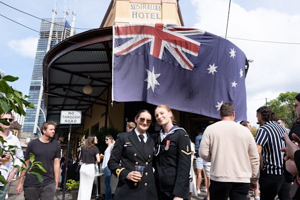People celebrating ANZAC Day at the The Australian heritage hotel in The Rocks, Sydney.