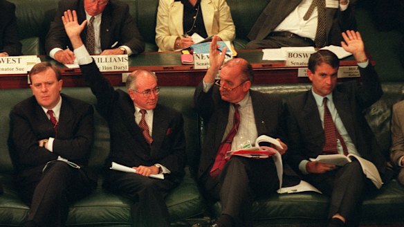 John Howard, Tim Fischer and John Anderson vote on a change to a resolution at the Constitutional Convention at Old Parliament House Canberra, without the support of Peter Costello.