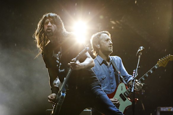 Dave Grohl (left) and Chris Shiflett of Foo Fighters perform onstage to a sold out crowd at GMHBA Stadium in Geelong during the US rock band's only Australian show.