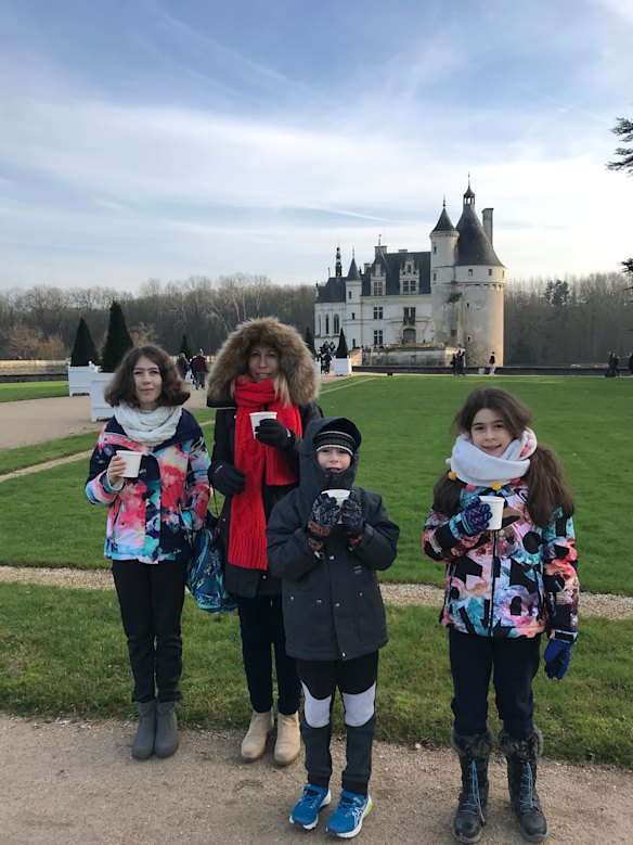 Chateau et cafe au lait? Lester in the Loire Valley in late 2018 researching The Riviera House with (from left) Ruby, Darcy and Audrey.