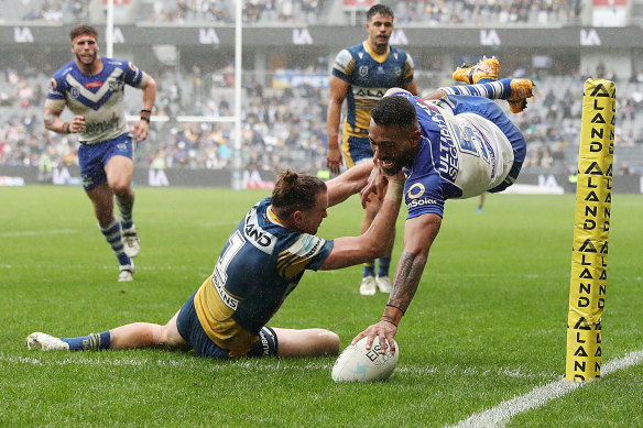 Tuipulotu Katoa scores in acrobatic fashion for Canterbury.