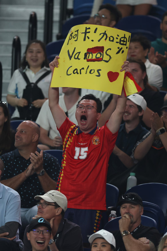 Carlos Alcaraz fans cheer him on.