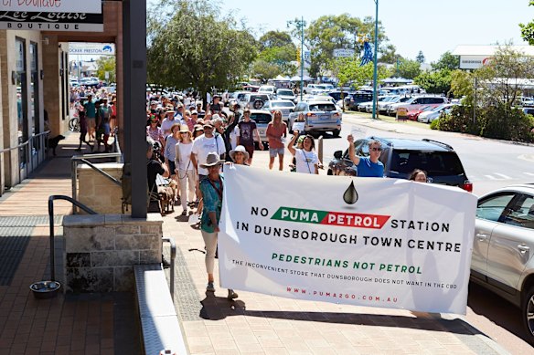 A protest against a proposed development of a Puma petrol station in the Dunsborough CBD. Protestors rally against a proposed 24-hour Puma petrol station in Dunsborough.