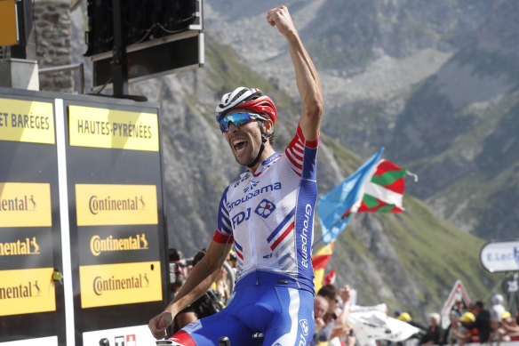 France's Thibaut Pinot celebrates as he crosses the finish line.