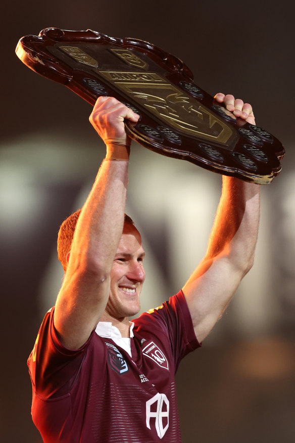 Maroons skipper Daly Cherry-Evans lifts the Origin shield for Queensland. 