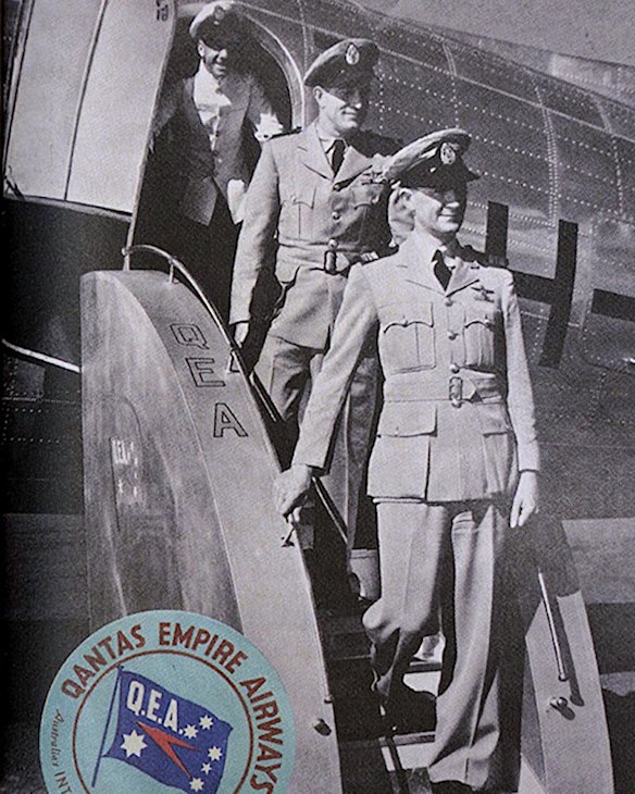 The first Qantas uniform worn by the flight crew was a military style khaki uniform with a navy fabric cap, black visor and a QEA badge c.1947.