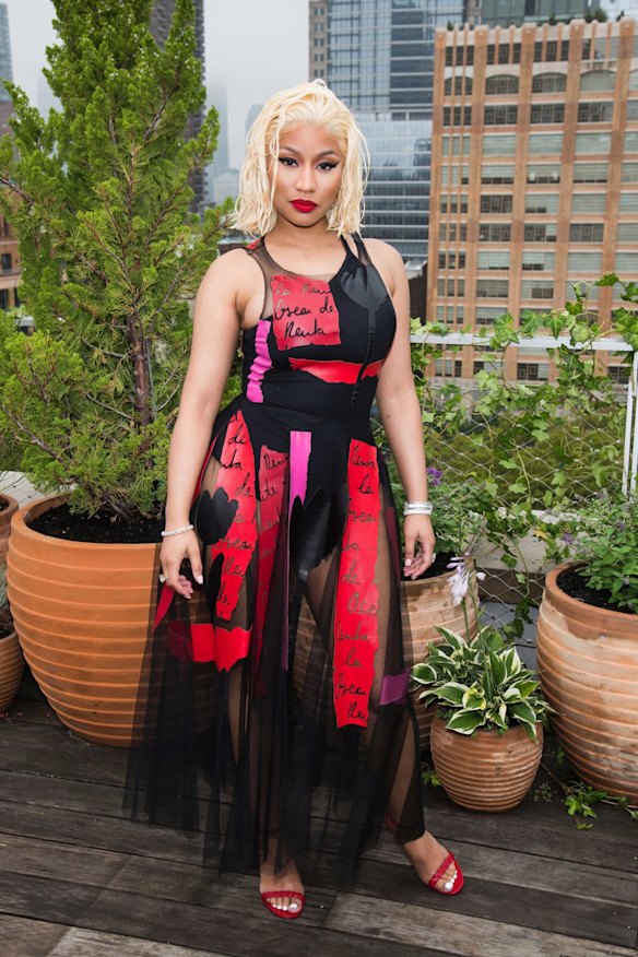 Nicki Minaj attends the Oscar de la Renta show during Fashion Week on Tuesday Sept. 11, 2018 in New York. (Photo by Charles Sykes/Invision/AP)0