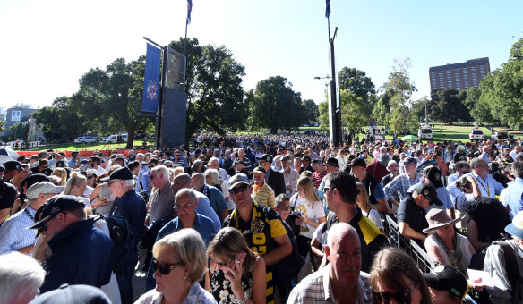 The crowd is building outside the MCG ahead of Thursday night's opening round clash.