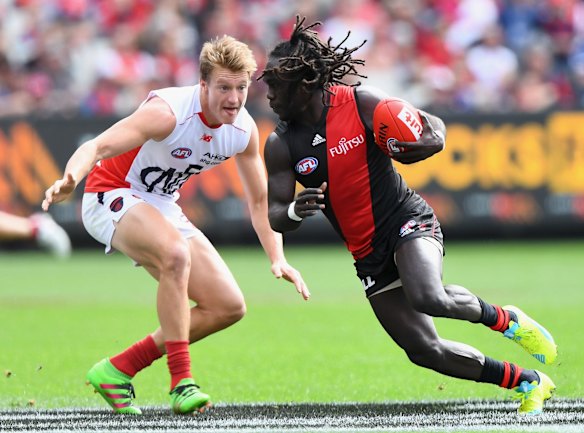McDonald-Tipungwuti showing his skills in evading Demons' Aaron Vandenberg.