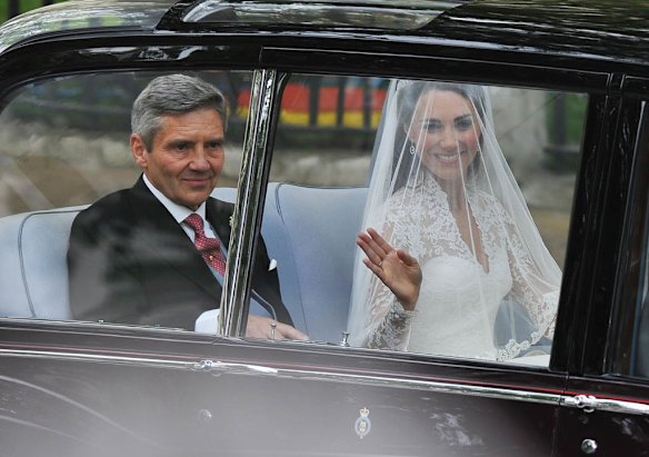 Kate Middleton travels in a Rolls Royce Phantom VI, accompanied by her father Michael Middleton to Westminster Abbey.